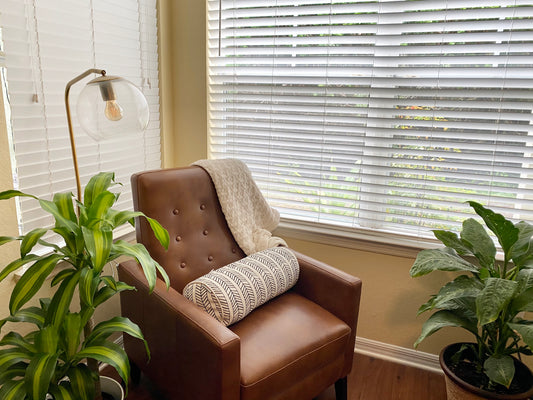 Plants in reading nook with bright, indirect light